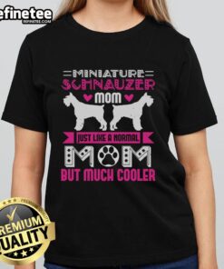 Awesome Miniature Schnauzer mom wearing a stylish tee, showcasing her love for dogs and cool mom vibes.