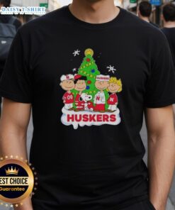 Alt Text: Awesome Peanuts Characters Christmas T-Shirt featuring Nebraska Cornhuskers design, perfect for festive fans.