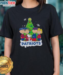 Alt Text: Awesome Peanuts characters on New England Patriots Christmas ladies tee, perfect for holiday football fans.