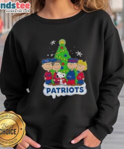 Awesome Peanuts characters Christmas sweatshirt featuring New England Patriots design, perfect for festive football fans.
