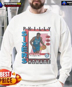 Alt Text: Awesome Philadelphia 76ers trading card sweatshirt featuring Joel Embiid in vibrant team colors and design.