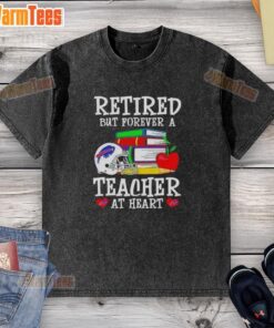 Awesome retired but forever a teacher at heart Buffalo Bills football washed t-shirt displayed on a wooden background.