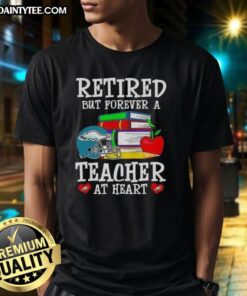 Alt Text: Awesome retired but forever a teacher at heart Philadelphia Eagles football t-shirt in green with white graphics.
