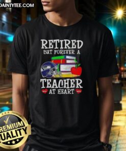 Awesome retired but forever a teacher at heart Seattle Seahawks football T-shirt design featuring team colors and logo.