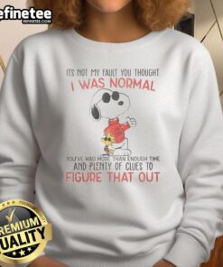 Awesome Snoopy sweatshirt with 'It's Not My Fault You Thought I Was Normal' text design, perfect for casual wear.