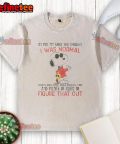 Alt Text: Awesome Snoopy t-shirt featuring the quote 'It's not my fault you thought I was normal' in vibrant colors.