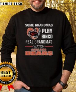 Grandmas enjoying bingo while wearing a Chicago Bears sweatshirt with a diamond heart design, celebrating game day.