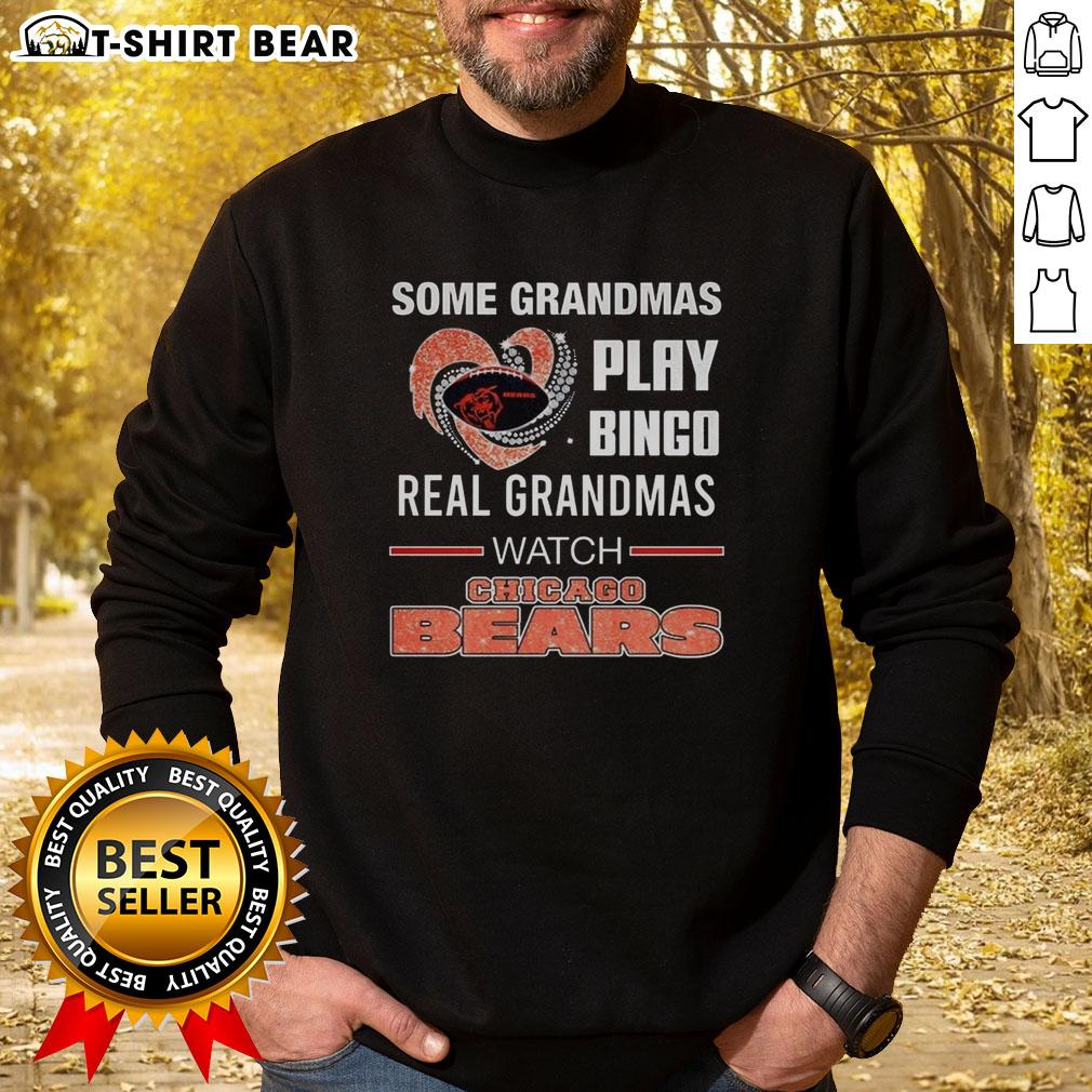 Awesome Some Grandmas Play Bingo Real Grandmas Watch Chicago Bears Football Diamond Heart Sweatshirt Grandmas enjoying bingo while wearing a Chicago Bears sweatshirt with a diamond heart design, celebrating game day.