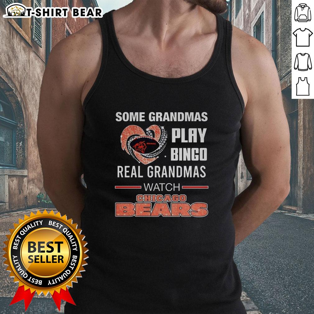 Awesome Some Grandmas Play Bingo Real Grandmas Watch Chicago Bears Football Diamond Heart Tank Top Grandmas enjoy bingo wearing Chicago Bears tank tops, showcasing fun and love for football in a vibrant setting.