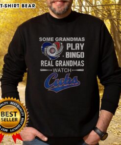 Grandmas playing bingo while wearing Chicago Cubs baseball sweatshirts, showcasing fun moments and team spirit.