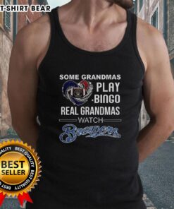 Real grandmas play bingo in Milwaukee Brewers gear, showcasing their love for baseball in heart tank tops.
