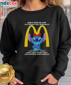 Alt Text: Grumpy girl in McDonald's sweatshirt with 'Don't Piss Me Off' quote, showcasing awesome stitch design and humor.