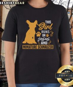 Awesome girl wearing a tee that says 'This Girl Runs On Jesus and Miniature Schnauzer' showcasing her love for faith and dogs.