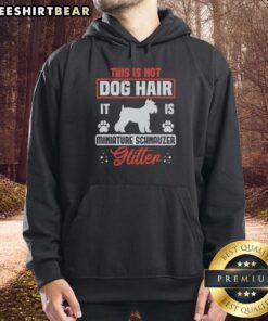 Alt Text: Miniature Schnauzer wearing a glitter hoodie, showcasing a stylish and adorable pet fashion choice. Perfect for dog lovers!