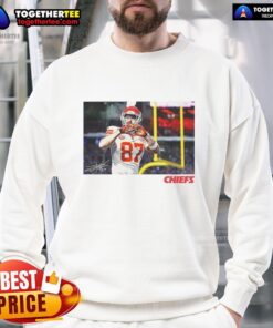 Awesome Travis Kelce Kansas City Chiefs football sweatshirt with heart signature design, perfect for fans.