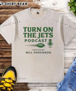 Awesome Turn On The Jets Podcast washed t-shirt featuring a stylish design, perfect for fans of the Jets and podcasts.
