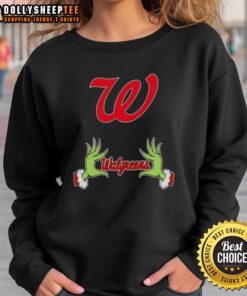 Awesome Walgreens X Grinch Hands Merry Christmas sweatshirt featuring festive design and cozy fit for holiday cheer.