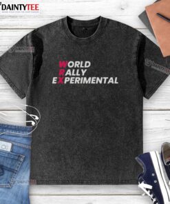 Awesome World Rally Experimental Essential Washed T-Shirt in vibrant colors displayed on a hanger against a neutral background.