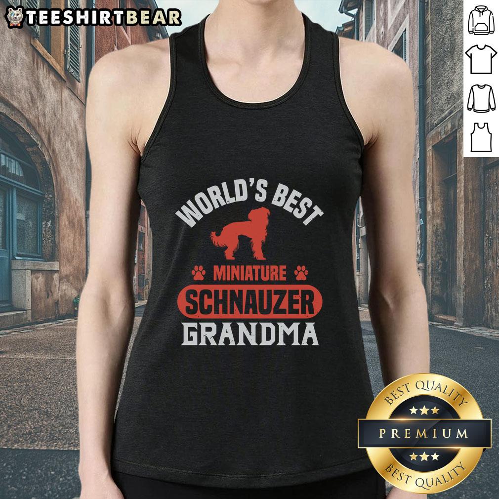 Awesome World'S Best Miniature Schnauzer Grandma Tank Top Grandma wearing an Awesome World's Best Miniature Schnauzer tank top, showcasing love for her pet schnauzer.