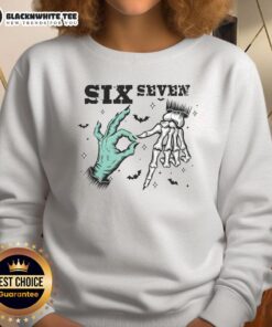 Cute Halloween sweatshirt featuring a meme witch with skeleton hands, perfect for festive fall attire.