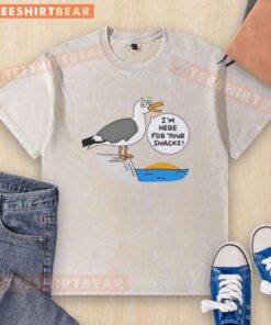 Cute beach t-shirt with 'I'm here for your snacks' slogan, perfect for summer fun and beach outings.