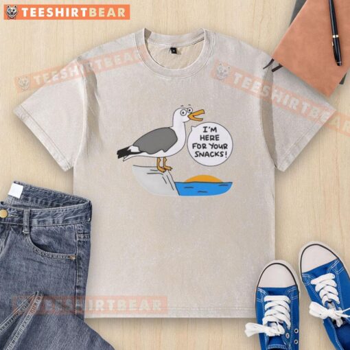 Cute beach t-shirt with 'I'm here for your snacks' slogan, perfect for summer fun and beach outings.