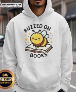 Alt Text: Cute bee buzzing on a stack of books, featured on a cozy 'Cute Bee Buzzed on Books' hoodie design.