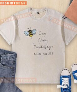 Cute bee design on a washed t-shirt with the phrase 'You Find Your Own Path' for a trendy and positive style.
