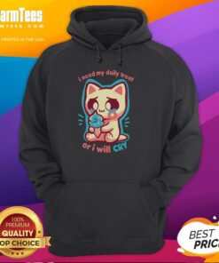 Cute cat wearing a hoodie with the phrase I Need My Daily Treat Or I'll Cry for pet lovers and cat apparel enthusiasts.