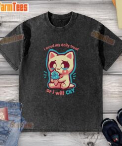 Alt Text: Adorable cat wearing a 'I Need My Daily Treat Or I'll Cry' washed T-shirt, showcasing its playful personality.