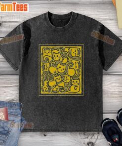 Cute doodle cats design on a washed t-shirt, perfect for cat lovers and casual wear enthusiasts.