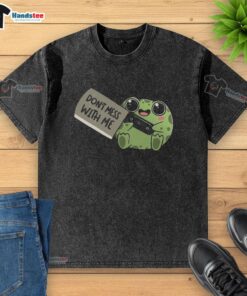 Alt Text: Cute frog graphic on a Be Warned, Don't Mess With Me washed t-shirt, perfect for casual wear and frog lovers.