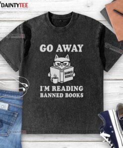 Cute cat wearing a Go Away, I'm Reading Banned Books washed t-shirt, perfect for book lovers and cat enthusiasts.