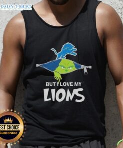 Alt Text: Cute Grinch wearing a Detroit Lions football tank top, showcasing holiday spirit and team pride in a festive setting.