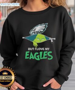Alt Text: Cute Grinch-themed sweatshirt expressing love for Philadelphia Eagles football, perfect for holiday game day spirit.