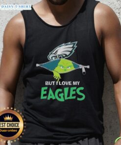 Cute Grinch wearing a Philadelphia Eagles football tank top, showcasing team spirit for NFL fans during the holidays.