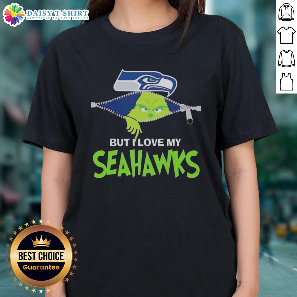 Cute Grinch But I Love My Seattle Seahawks Football Ladies Tee Alt Text: Cute Grinch graphic on a Seattle Seahawks football ladies tee, perfect for fans celebrating the holiday season.