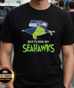 Alt Text: Cute Grinch wearing a Seattle Seahawks football T-shirt, showcasing team spirit and holiday cheer in a playful design.
