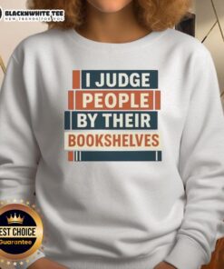 Alt Text: Cute I Judge People By Their Bookshelves Sweatshirt featuring colorful book graphics and a cozy design for book lovers.