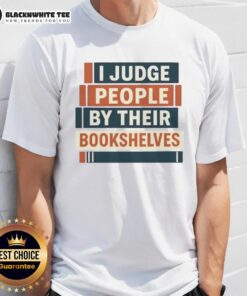 Alt Text: Cute I Judge People By Their Bookshelves T-Shirt design featuring colorful graphics and a playful font on a casual tee.