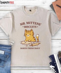 Adorable Mr. Mittens baked biscuits on a freshly washed t-shirt, showcasing the cute design and vibrant colors.