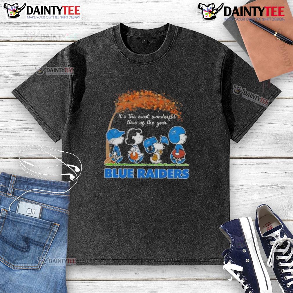 Cute Peanuts Snoopy And Friends It's The Most Wonderful Time Of The Year Blue Raiders Washed T-Shirt Alt Text: Cute Peanuts Snoopy and friends on a blue Raiders washed t-shirt for the most wonderful time of the year.
