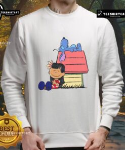 Alt Text: Cute Peanuts Snoopy X Stitch sweatshirt featuring It Means Nobody Gets Left Behind design, perfect for fans.