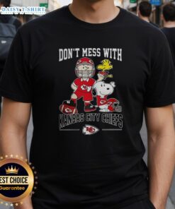 Alt Text: Cute Snoopy and Charlie Brown Peanuts Don't Mess With Kansas City Chiefs football T-shirt design for fans.