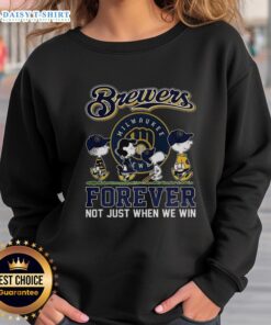 Cute Snoopy and friends sweatshirt for Milwaukee Brewers fans, perfect for baseball lovers year-round, not just during wins.