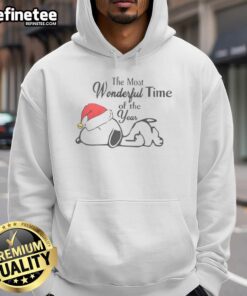 Alt Text: Cute Snoopy in a Christmas hat on a cozy hoodie, celebrating the most wonderful time of the year with festive cheer.
