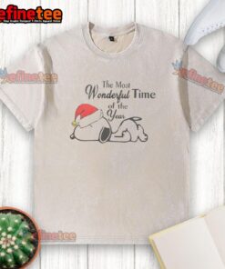 Alt Text: Cute Snoopy wearing a Christmas hat on a washed t-shirt, perfect for celebrating the most wonderful time of the year.