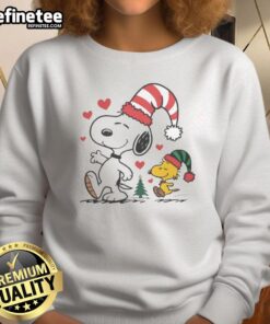 Cute Snoopy and Woodstock Christmas Love sweatshirt featuring festive designs perfect for holiday cheer.