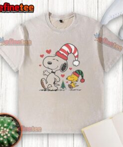 Alt Text: Cute Snoopy and Woodstock Christmas Love design on a washed t-shirt, perfect for holiday celebrations and Peanuts fans.