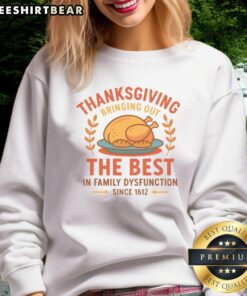 Alt Text: Cute Thanksgiving sweatshirt featuring 'Bringing Out The Best In Family Dysfunction' design for holiday gatherings.